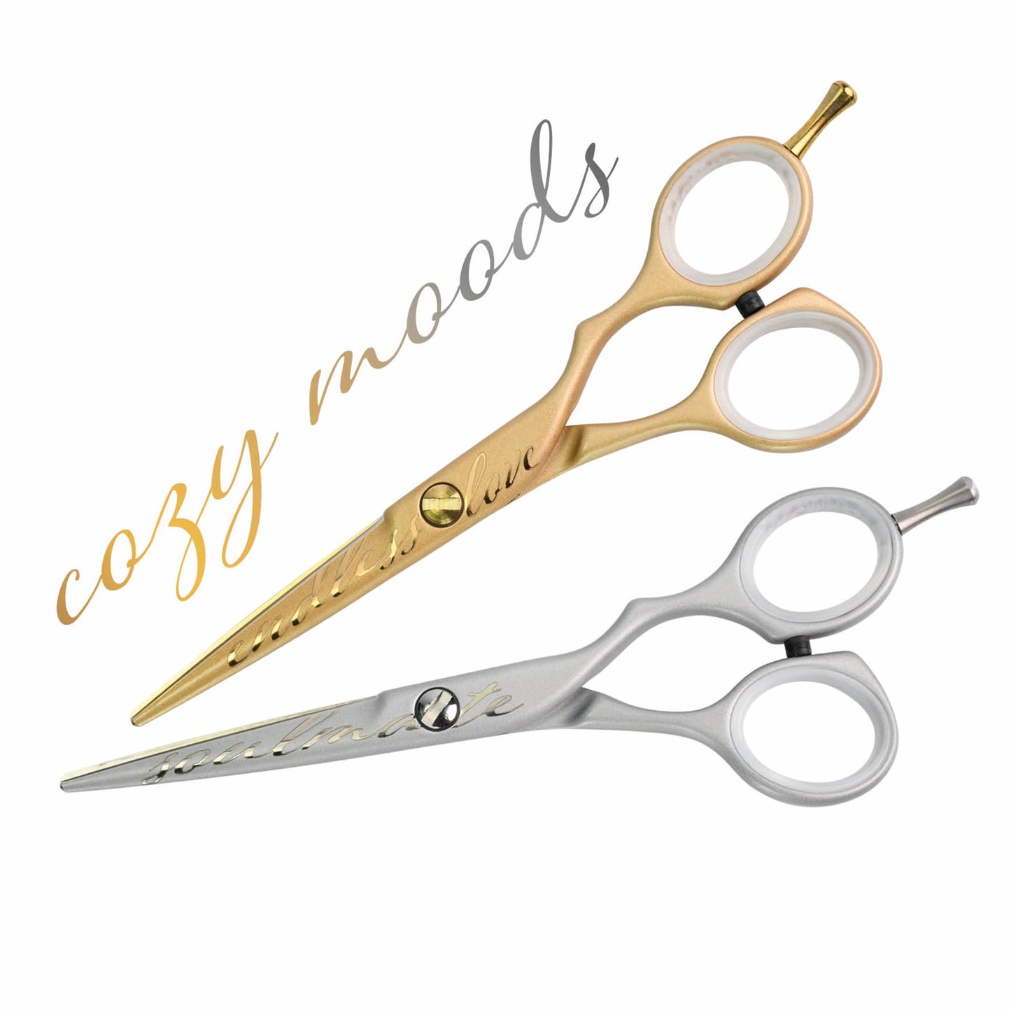 Golden hairdressing scissors with engraving.