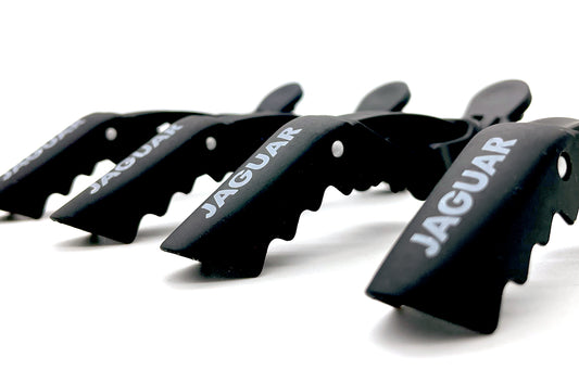 Black crocodile clip for hair.