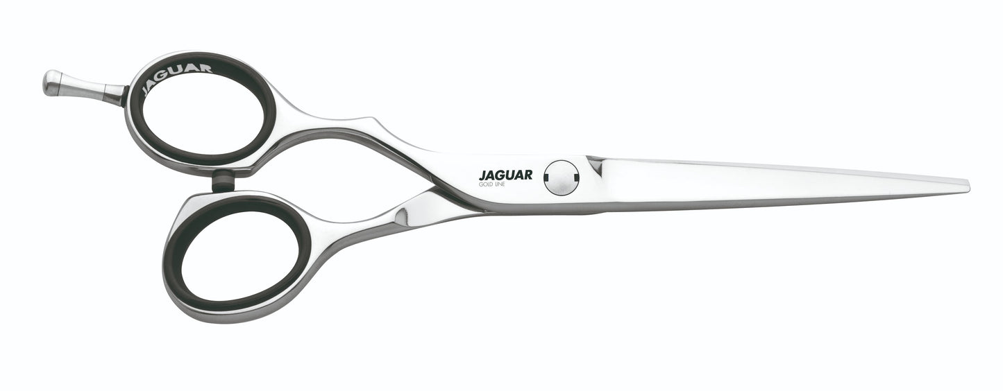 Hairdressing scissors with black handles.