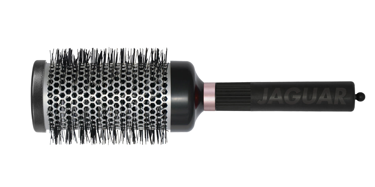 Round brush with black handle.