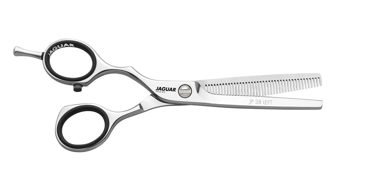 Modeling scissors with serrated blades.