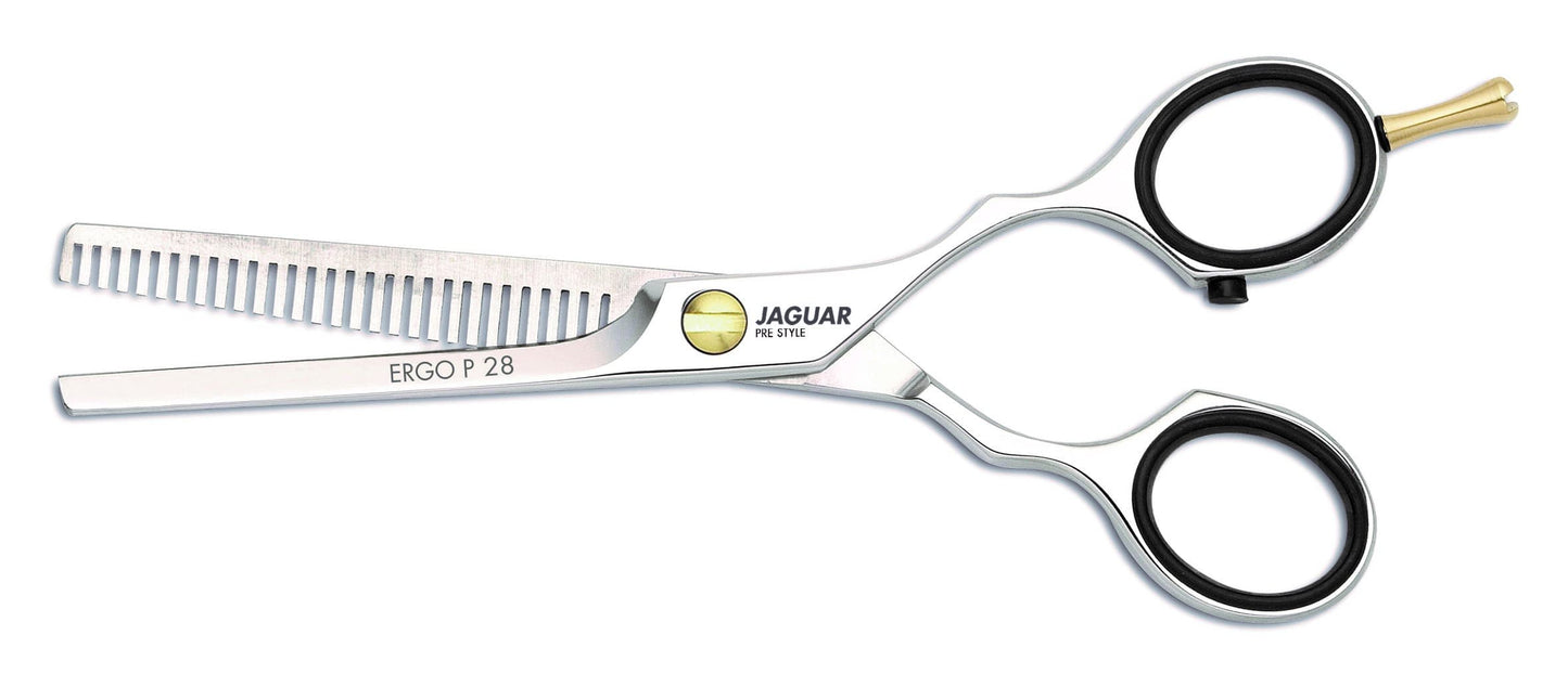 Hairdressing scissors with serrated blades.