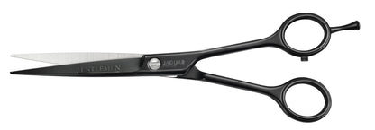 Hairdressing scissors with black handles.