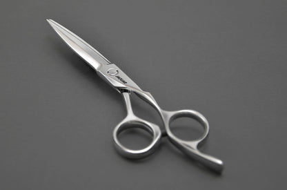 Hairdressing scissors with ergonomic design.