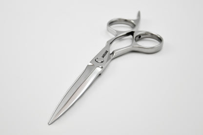 Hairdressing scissors with ergonomic design.