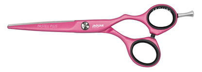 Pink hairdressing scissors with offset handle.