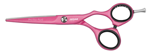 Pink hairdressing scissors with offset handle.
