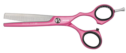 Pink modeling scissors for hairdressers.