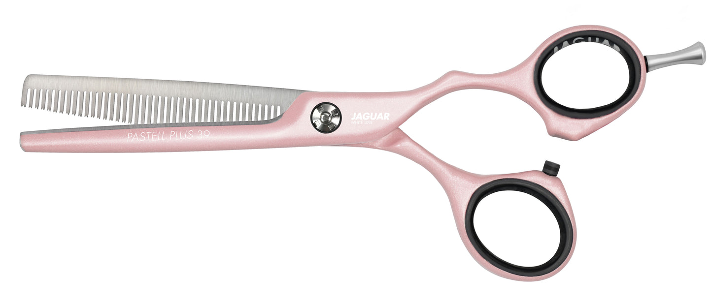Pink modeling scissors for hairdressers.