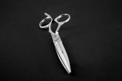 Hairdressing scissors with ergonomic design.