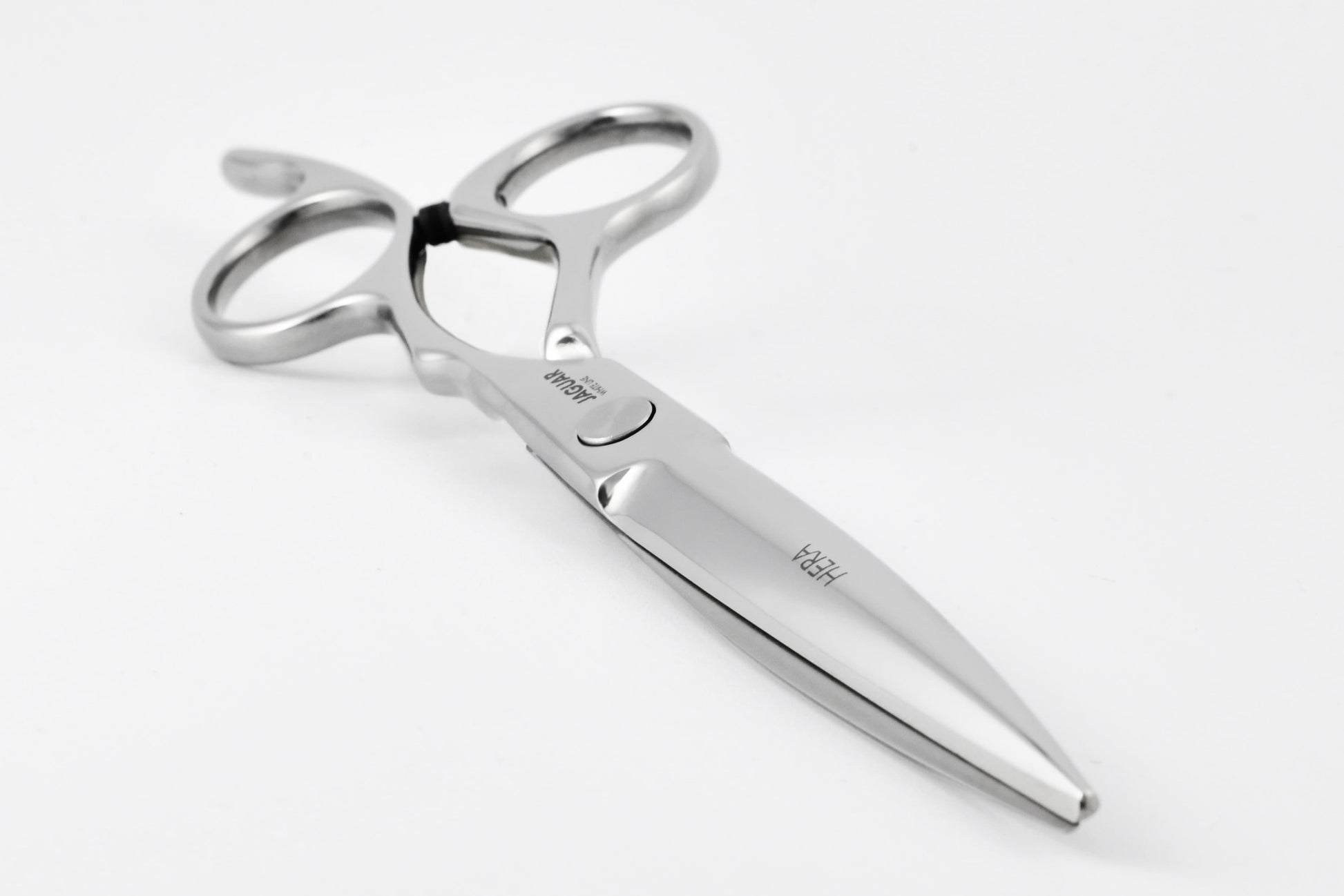 Hairdressing scissors with ergonomic design.