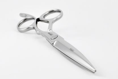 Hairdressing scissors with ergonomic design.