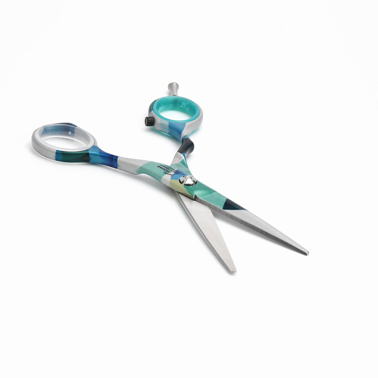 Colorful hairdressing scissors with pattern.