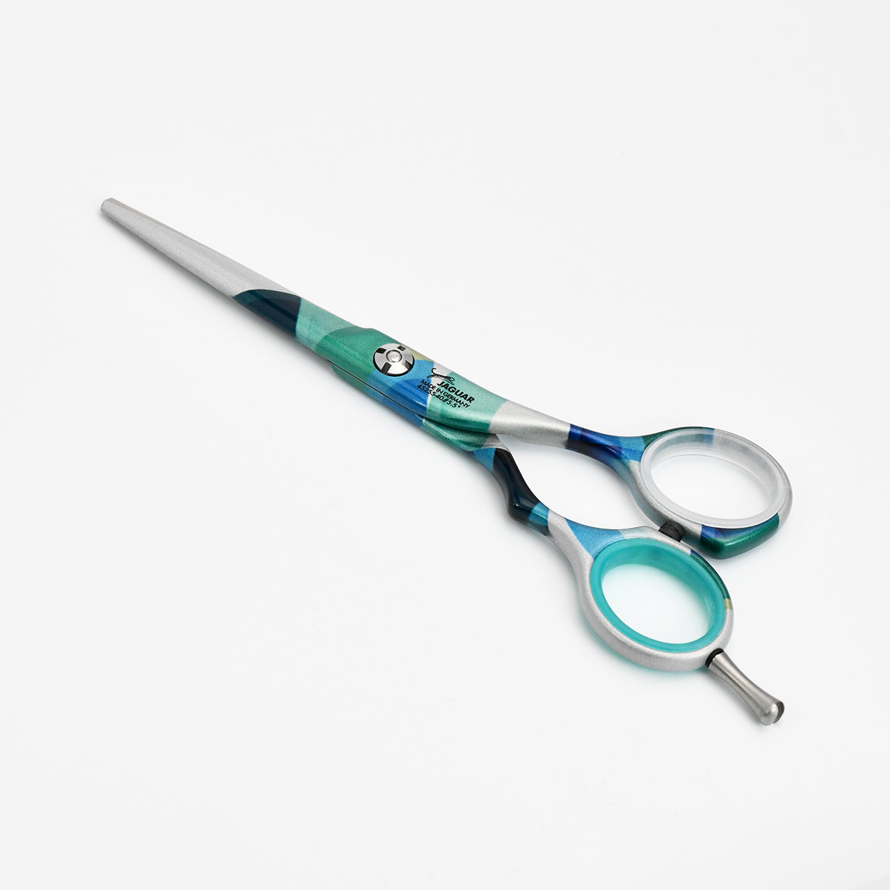 Colorful hairdressing scissors with pattern.