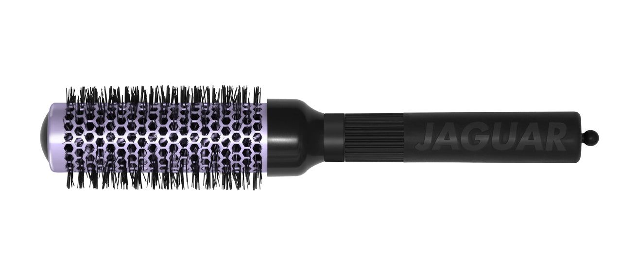 Four colorful round brushes for hairdressers.