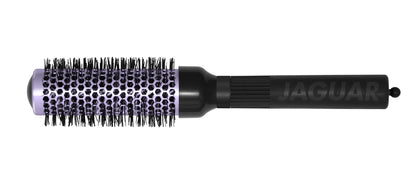 Four colorful round brushes for hairdressers.