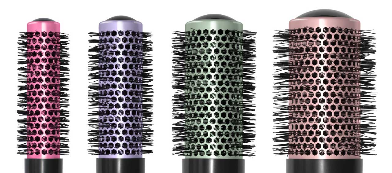 Four colorful round brushes for hairdressers.