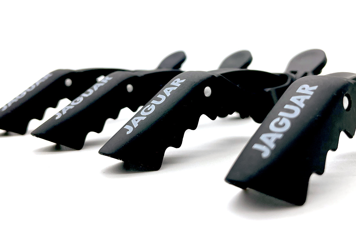 Black crocodile clip for hair.