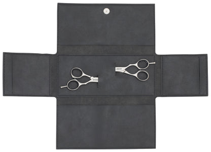 Open scissor case with two pairs of scissors.