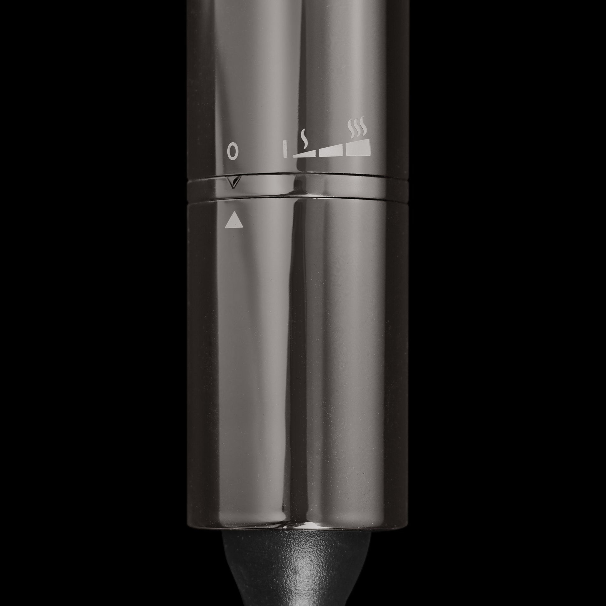 Curling iron with black handle.