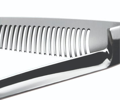 Hairdressing scissors with serrated blades.