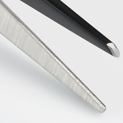 Hairdressing scissors with black handles.