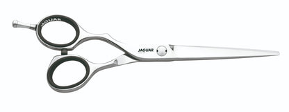 Hairdressing scissors with black handles.