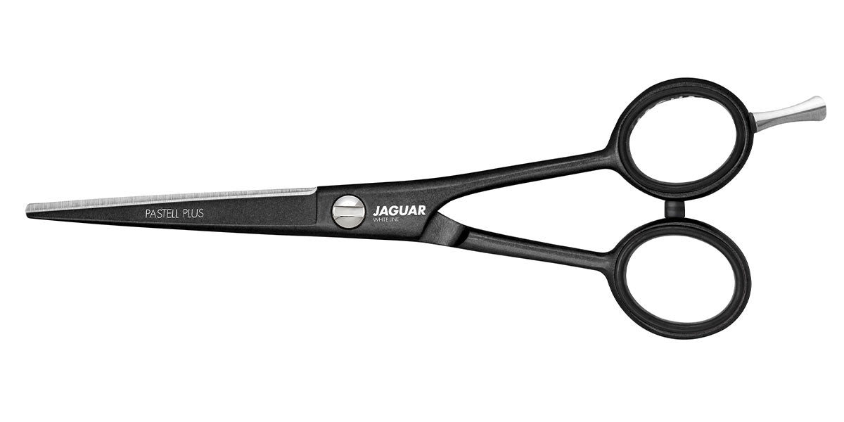 Hairdressing scissors with black handles.