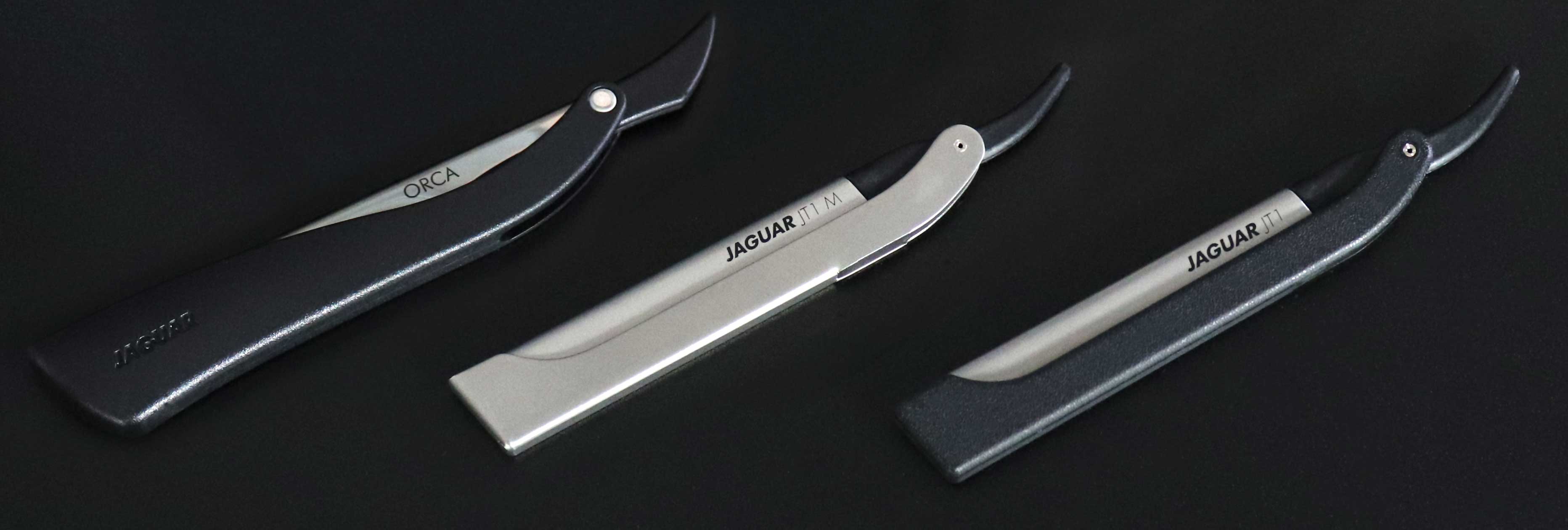 Three JAGUAR razors (ORCA, JT1 M, and JT1) arranged side by side on a black background.
