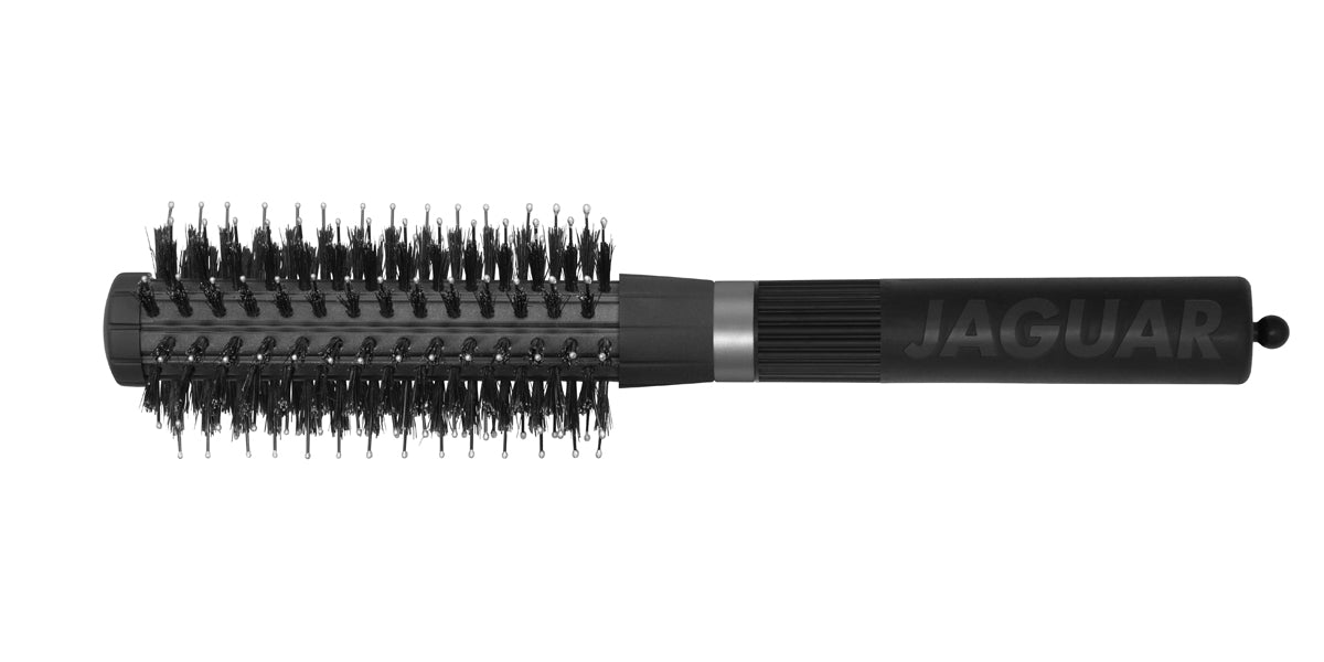 Round brush with black handle.