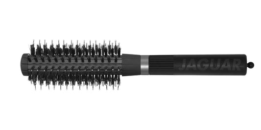 Round brush with black handle.