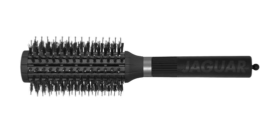 Round brush with black handle.