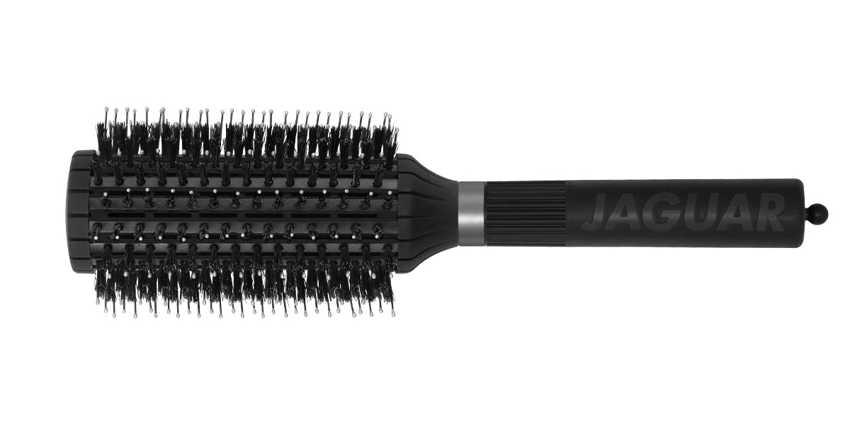 Round brush with black handle.