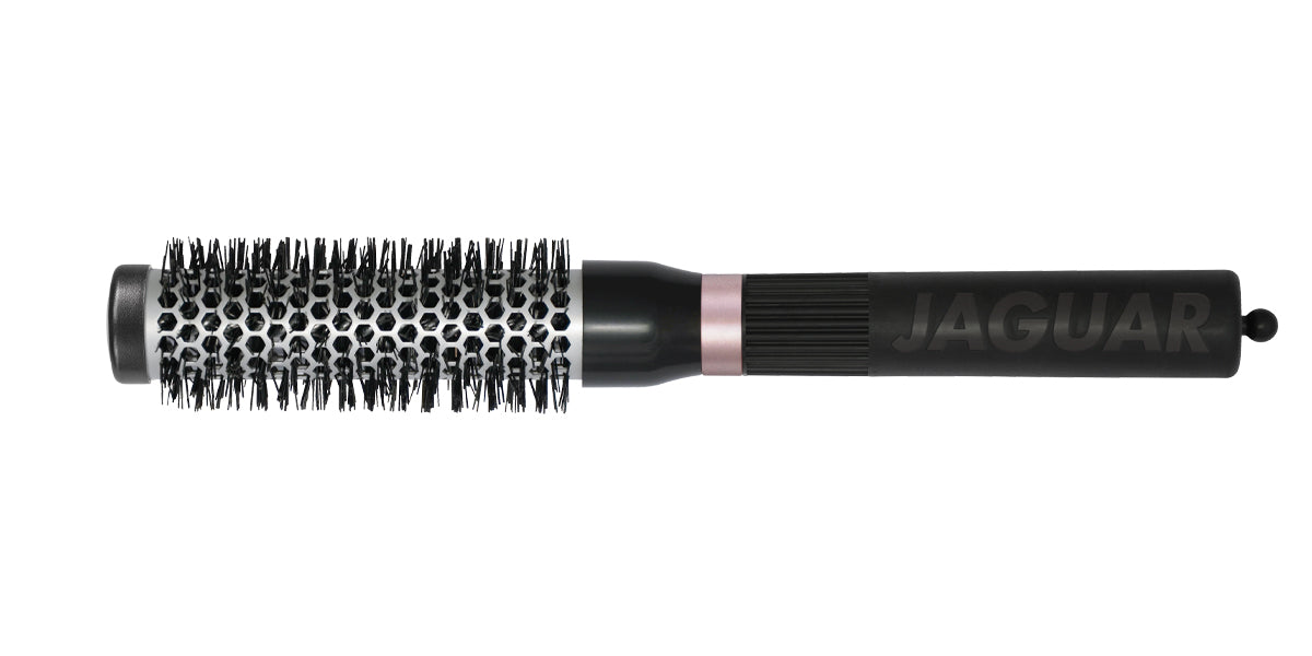 Round brush with black handle.