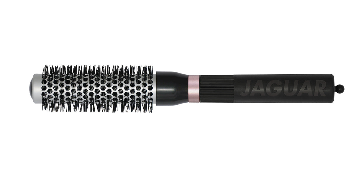 Round brush with black handle.