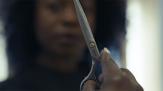 Hairdressing scissors with ergonomic design.