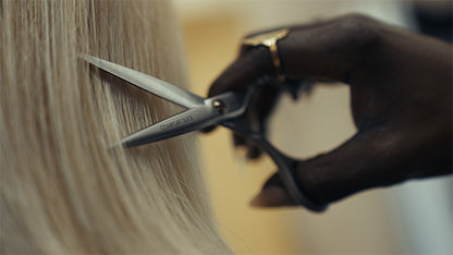 Hairdressing scissors with ergonomic design.