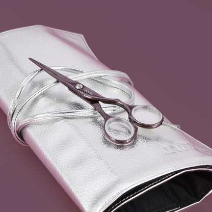 Hairdressing scissors, round brush, case, accessories.