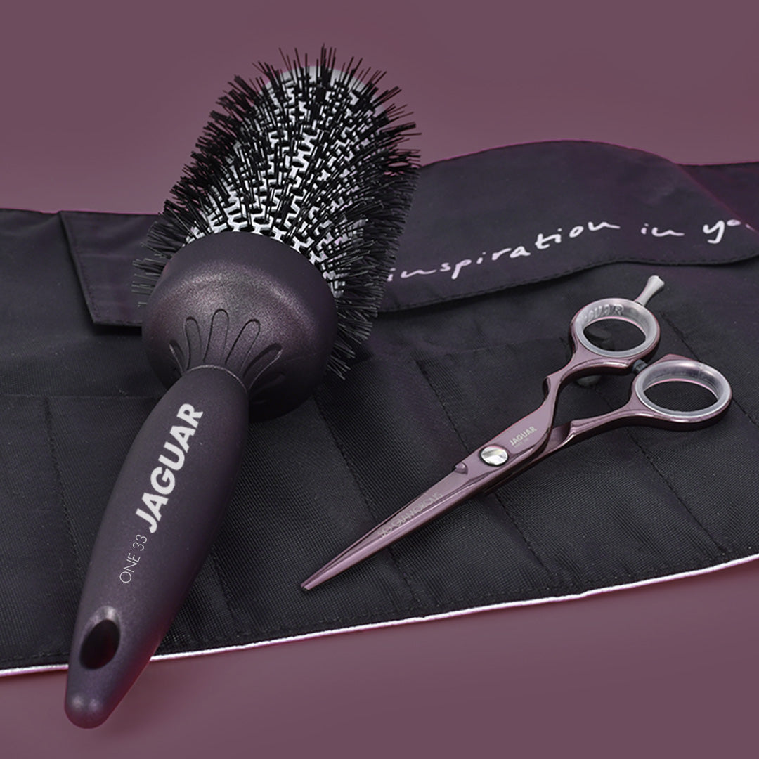 Hairdressing scissors, round brush, case, accessories.