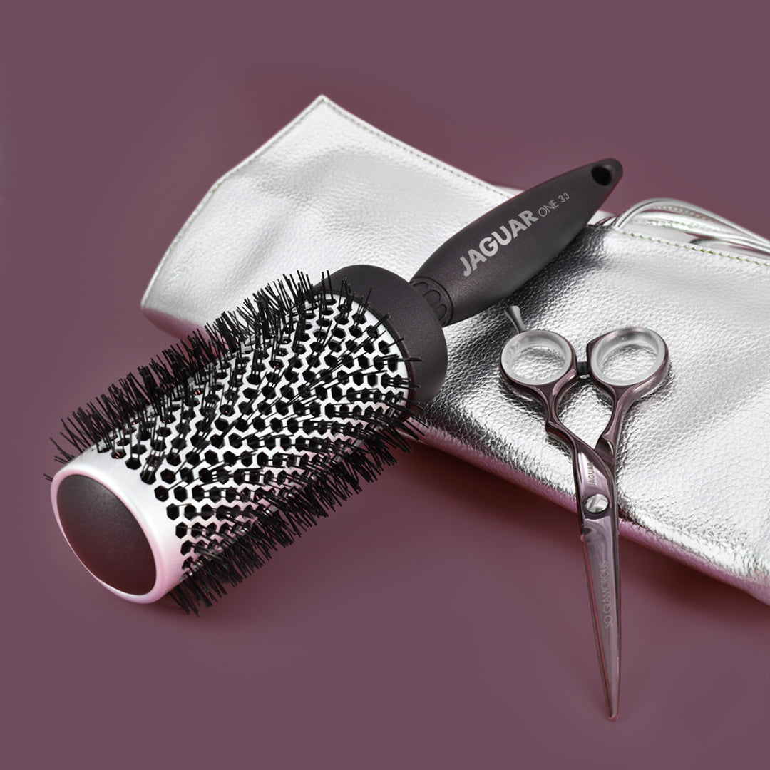 Hairdressing scissors, round brush, case, accessories.