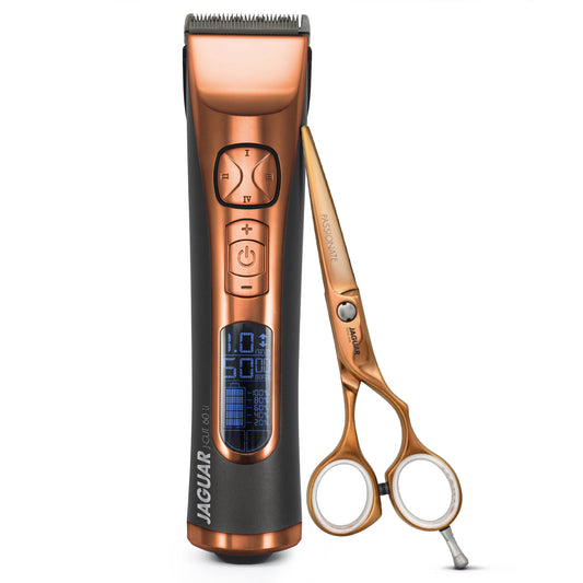 Hair clippers and scissors in copper.