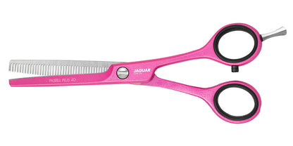 Pink modeling scissors for hairdressers.