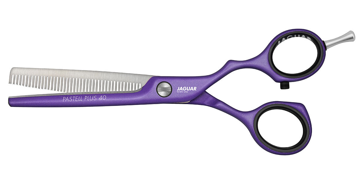 Purple styling scissors for hairdressers.