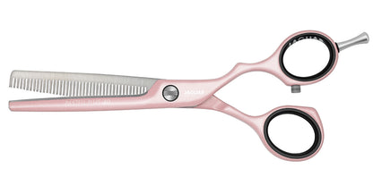 Pink modeling scissors for hairdressers.