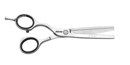 Modeling scissors with serrated blades.