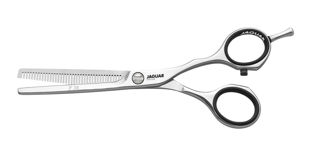 Modeling scissors with serrated blades.