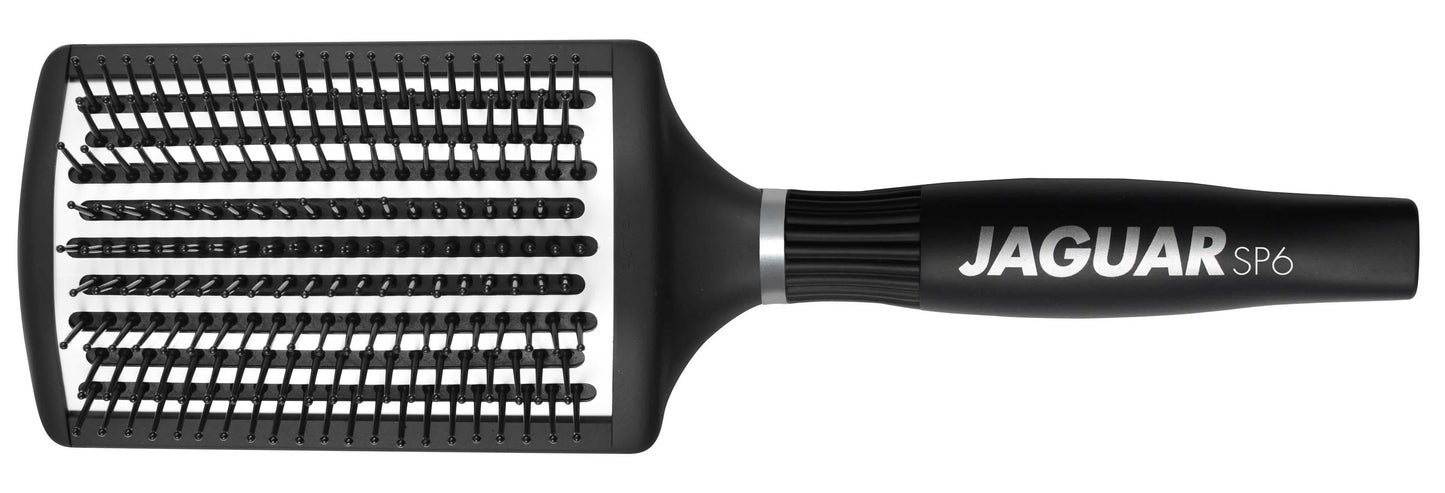 Paddle brush with black handle.