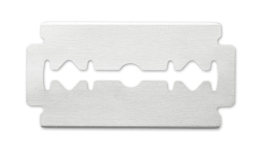 Razor blade in packaging, Jaguar logo.