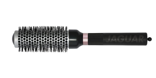 Round brush with black handle.