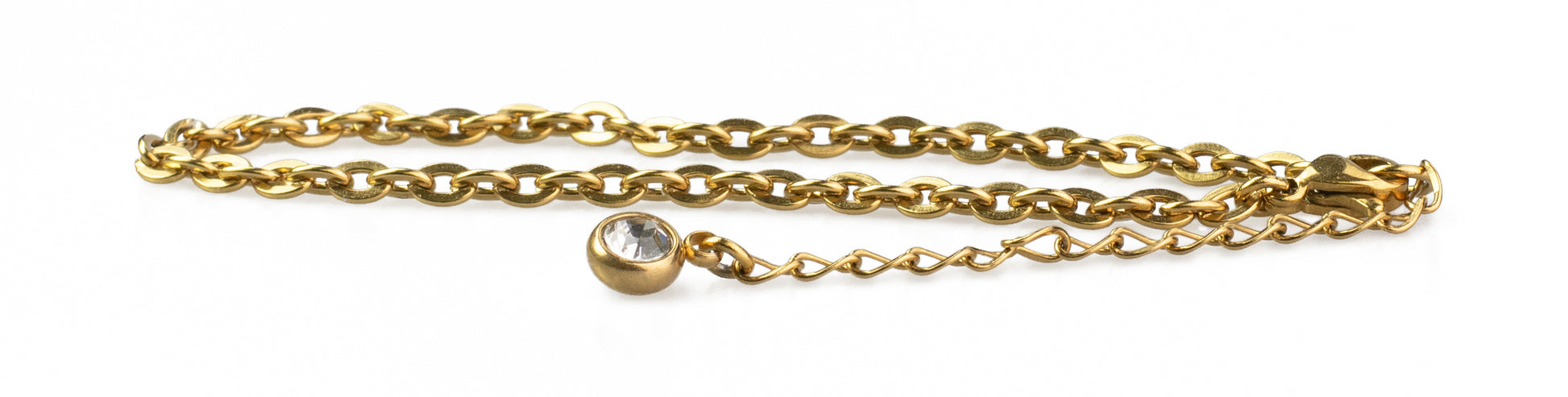 Golden hairdressing scissors with an ergonomic design.